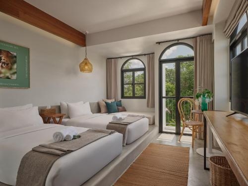 โรงแรม เดอะ โมทีฟส์ อีโค่ โฮเทล (The Motifs Eco Hotel)0