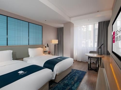 โรงแรมอีชาร์ม เฮยหยวน หลงชวน (Echarm Hotel Heyuan Longchuan)1