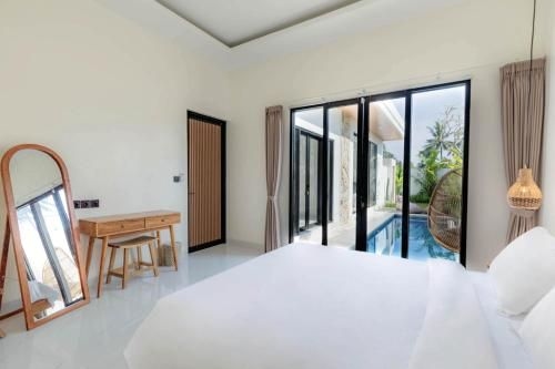 วิลล่ามอลอร์กา อูบุด 4 ห้องนอน พร้อมสระว่ายน้ำ (Villa Mallorca Ubud 4Bed w/ Pool)2