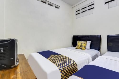 SPOT ON 90744 Alika Homestay4