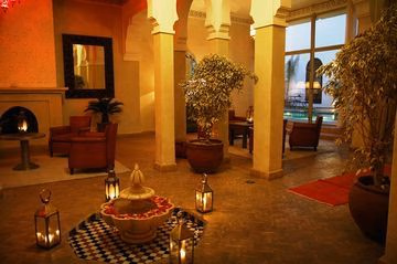 Riad Shama0