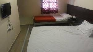 JM Comforts Hotel0