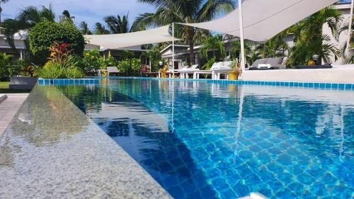 โคโคนัท ปาล์ม รีสอร์ต (CoconutsPalm Resort)0