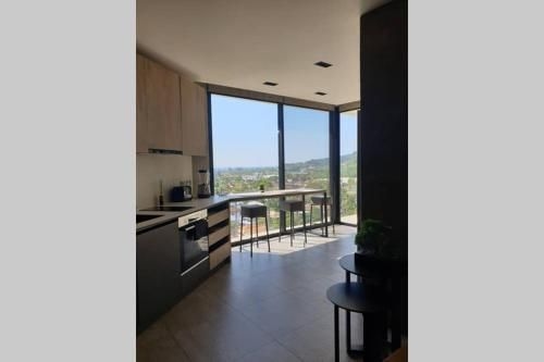 Modern Apartment with Full Panorama View0