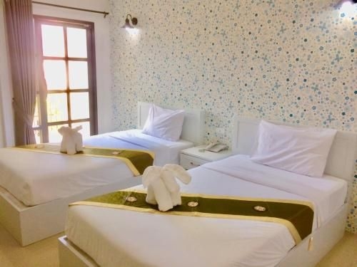 โรงแรมพลอยเพิร์ล (Ploy's Pearl Hotel)0