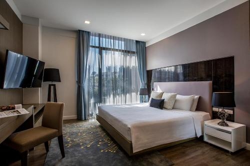 เมโทรโพลิส สวีทส์ แบงค็อก แทพเพสทรี คอลเลคชั่น บาย ฮิลตัน (Metropolis Suites Bangkok, Tapestry Collection by Hilton)1