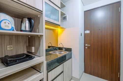 Warm Studio Room Transpark Cibubur By Travelio