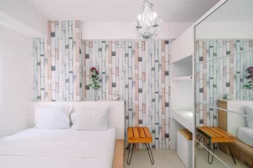 Warm and Cozy 2BR at Bassura City Apt By Travelio