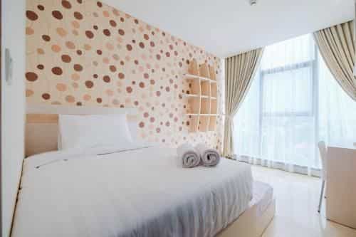 Apt 2BR Cozy and Modern L'Avenue By Travelio