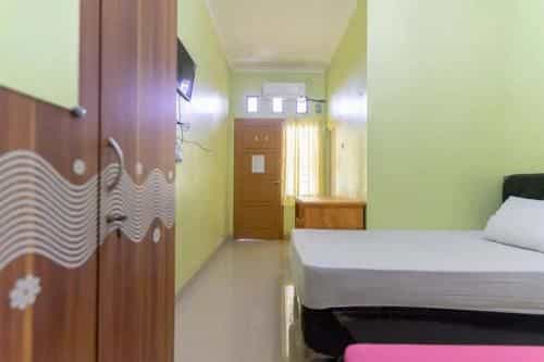 Kostawira Syariah Bintaro Mitra RedDoorz Kostawira Syariah Bintaro Mitra RedDoorz