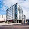 Glo Hotel Sello