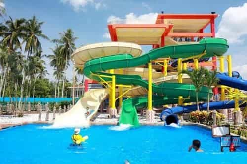 Luxury beach apartments with infinity pools by water park