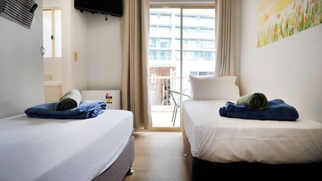 Single Beds/King Size with Balcony