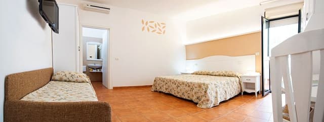 Family Quadruple Room, 1 Queen Bed with Sofa bed, Garden View