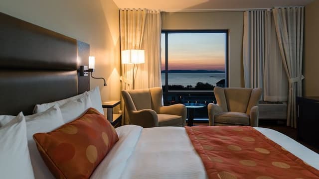 Aqua room with 1 king bed, river view