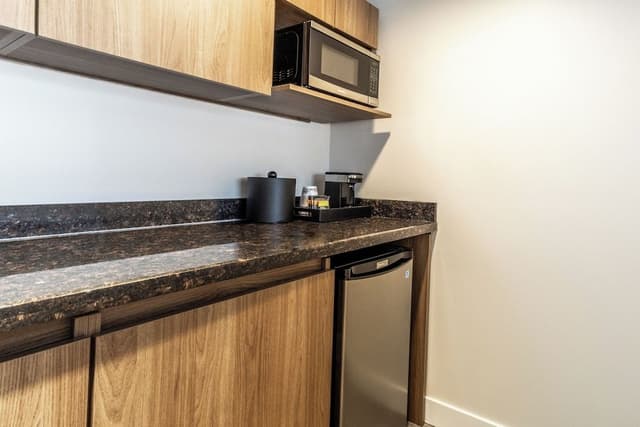 Suite, 1 King Bed with Sofa bed, Kitchenette, Corner