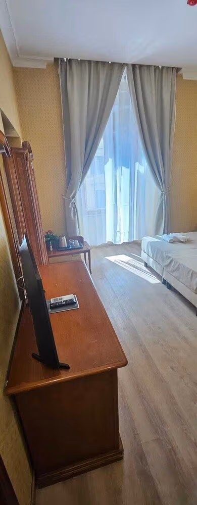 Deluxe Triple Room, City View