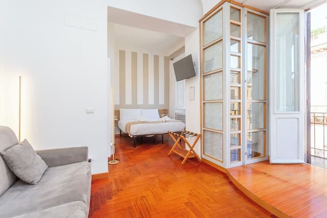 Junior Quadruple Room, Balcony, City View