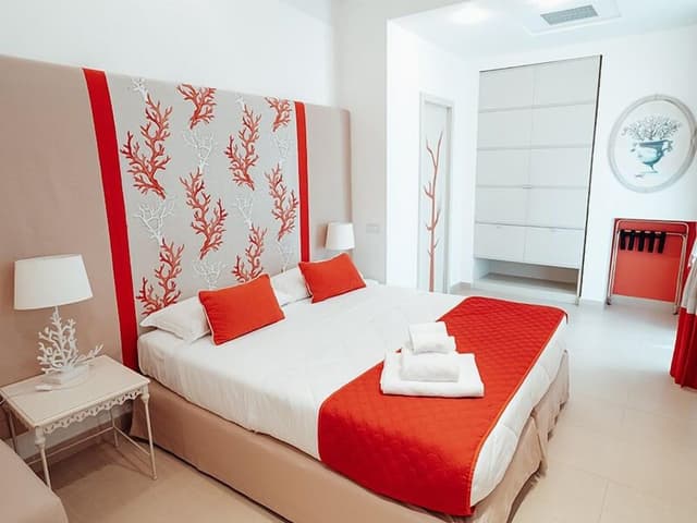 Camere Comunicanti, Balcone Vista Mare