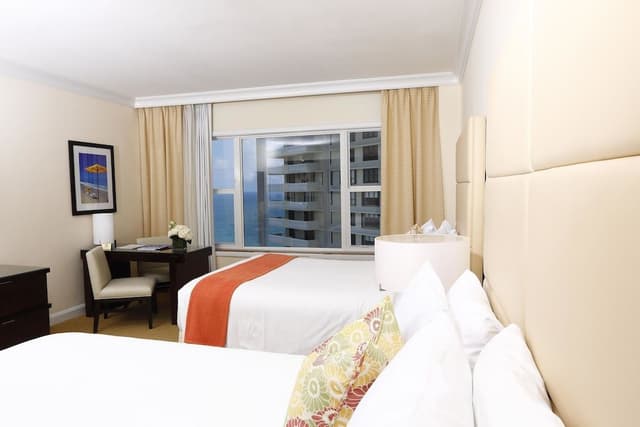 Partial Ocean No Balcony, Two Double Beds