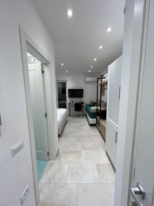 Deluxe Triple Room, Partial Sea View