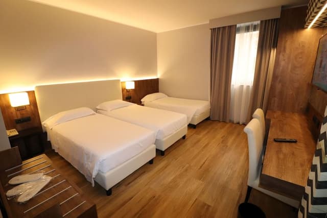 Family Quadruple Room (5 people)