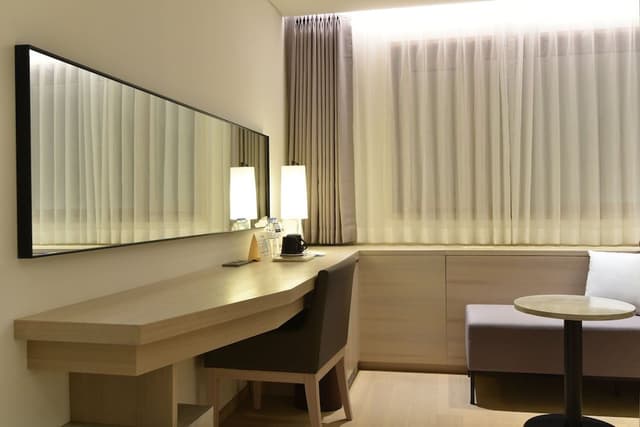 Deluxe Twin Room (1 Double Bed + 1 Single Bed)