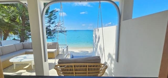 Beach Front Suite with One Way Airport Transfer