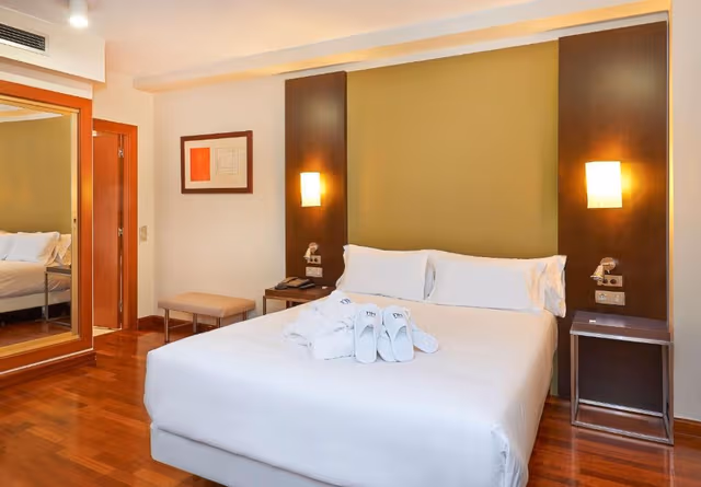 Family Adjoining Room with Extra Bed (4 Adults + 1 Child)