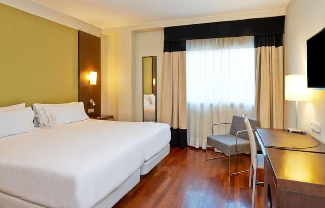 Family Adjoining Room with Extra Bed (4 Adults + 1 Child)