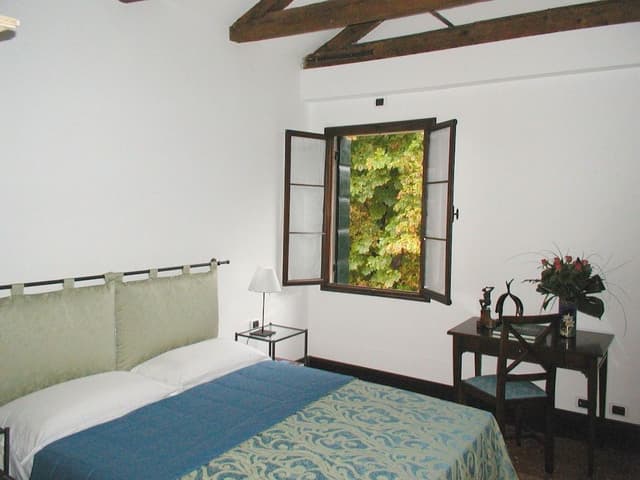 Classic Double Room, Garden View (includes bike use, Brut wine bottle with fruit)