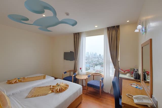 Deluxe twin room with partial sea view