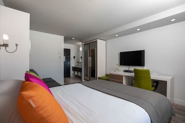 Chambre Executive , 1 lit Queen 1 lit escamotable