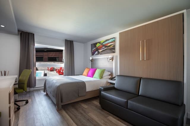 Chambre Executive , 1 lit Queen 1 lit escamotable