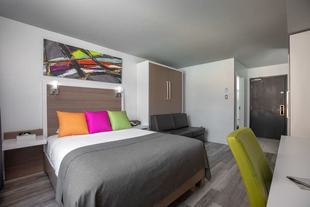 Chambre Executive , 1 lit Queen 1 lit escamotable