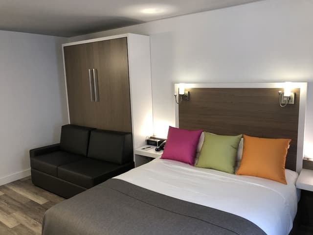 Chambre Executive , 1 lit Queen 1 lit escamotable