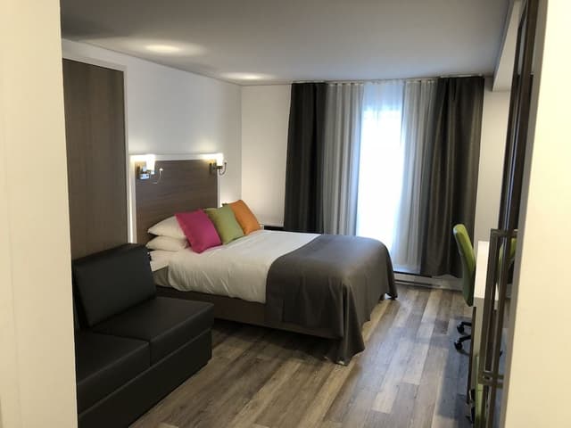 Chambre Executive , 1 lit Queen 1 lit escamotable