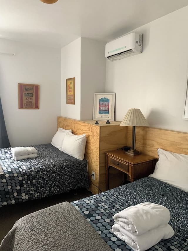 Economy Double or Twin Room, 2 Queen Beds, Non Smoking, Shared Bathroom