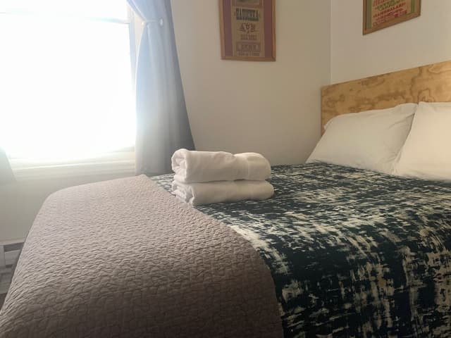 Economy Double or Twin Room, 2 Queen Beds, Non Smoking, Shared Bathroom