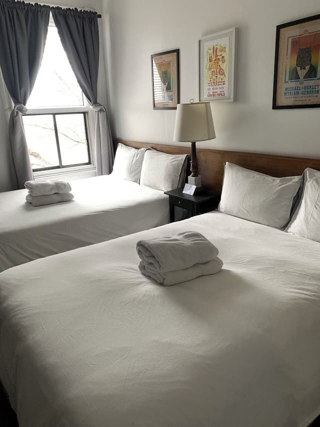 Economy Double or Twin Room, 2 Queen Beds, Non Smoking, Shared Bathroom