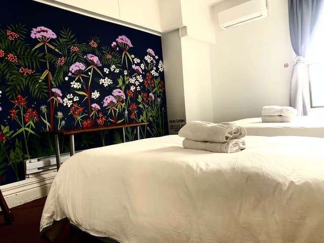 Economy Double or Twin Room, 2 Queen Beds, Non Smoking, Shared Bathroom