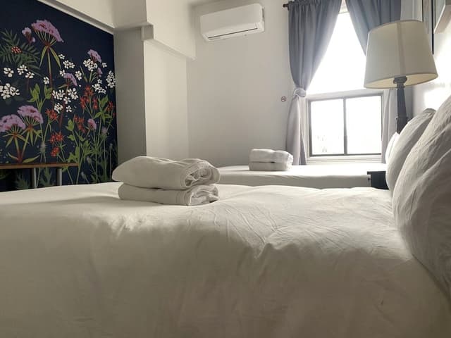 Economy Double or Twin Room, 2 Queen Beds, Non Smoking, Shared Bathroom