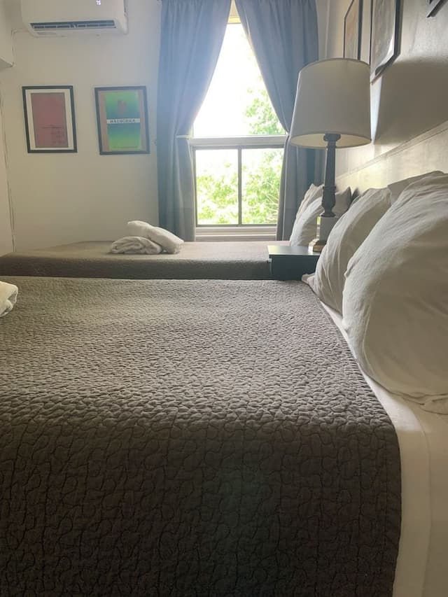 Economy Double or Twin Room, 2 Queen Beds, Non Smoking, Shared Bathroom