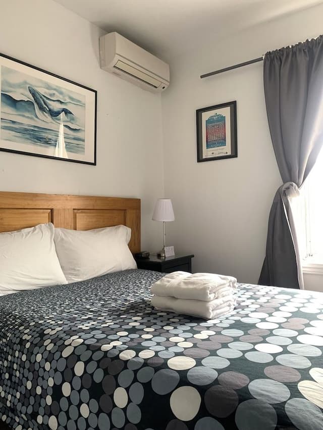 Economy Double Room, 1 Queen Bed, Non Smoking, Shared Bathroom