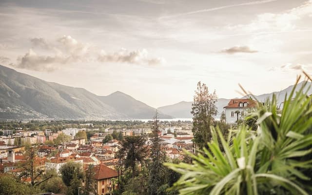 Panorama Deluxe Double Room, Balcony with panoramic view over city, mountains & lake