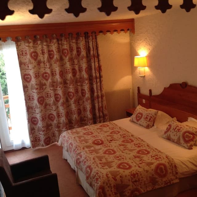 Standard Triple Room West (village view)
