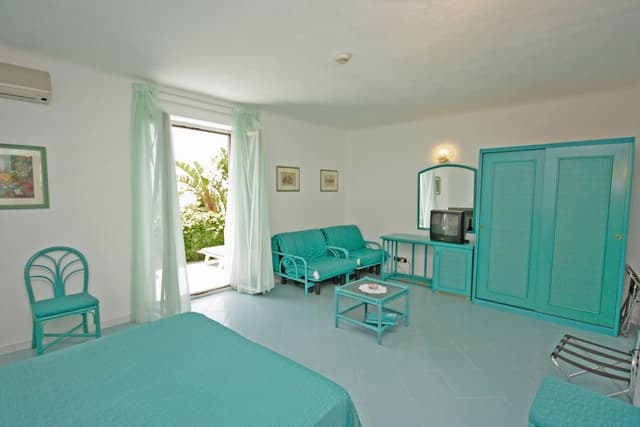 Standard Quadruple Room, Garden View