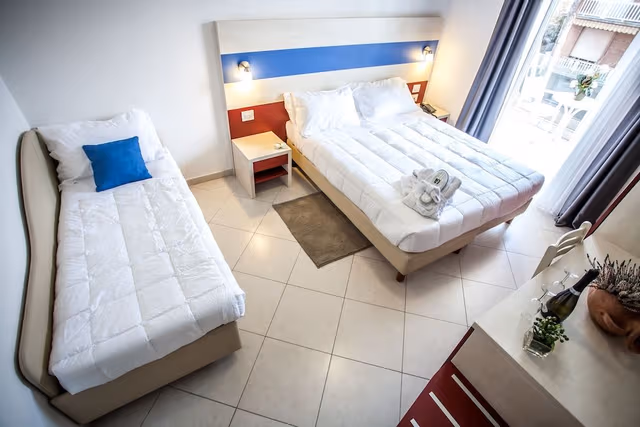 Deluxe Triple Room