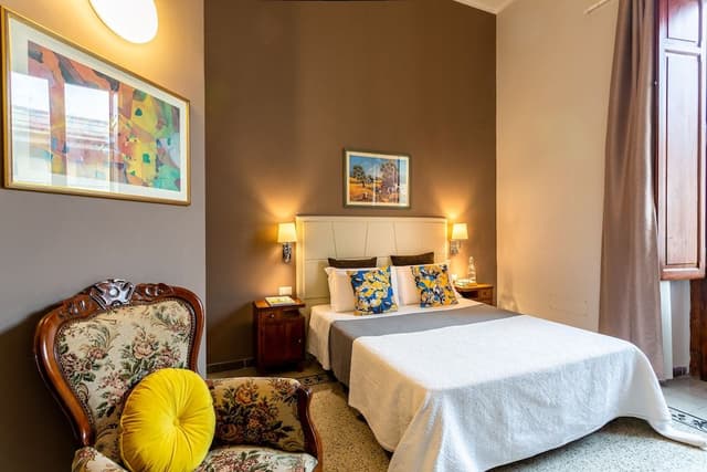 Comfort Double Room, 1 Bedroom, Refrigerator & Microwave, City View