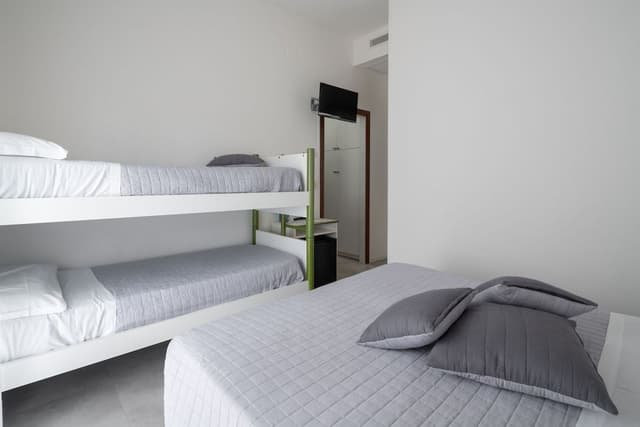 Basic Quadruple Room, Multiple Beds, Balcony